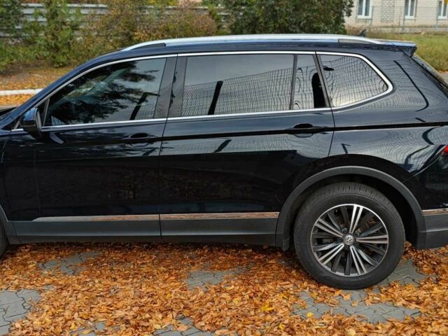 Черный Фольксваген Тигуан, объемом двигателя 2 л и пробегом 314 тыс. км за 14700 $, фото 2 на Automoto.ua