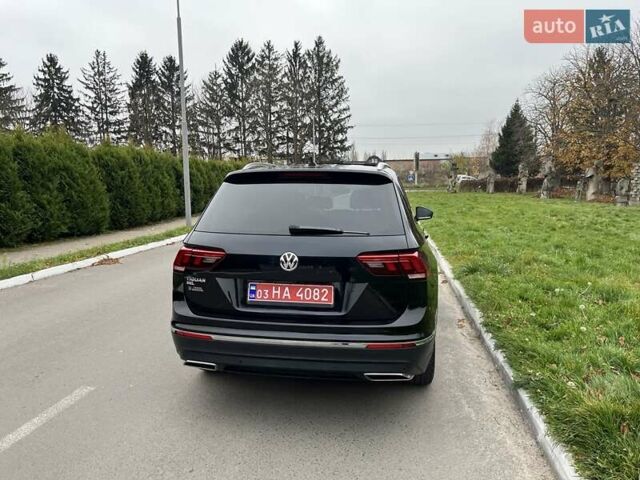 Чорний Фольксваген Тігуан, об'ємом двигуна 2 л та пробігом 124 тис. км за 19500 $, фото 76 на Automoto.ua