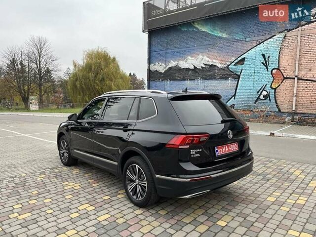 Чорний Фольксваген Тігуан, об'ємом двигуна 2 л та пробігом 124 тис. км за 19500 $, фото 7 на Automoto.ua