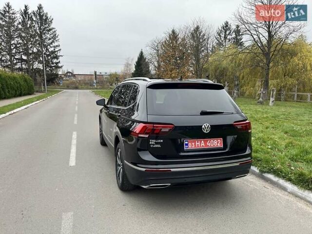 Чорний Фольксваген Тігуан, об'ємом двигуна 2 л та пробігом 124 тис. км за 19500 $, фото 75 на Automoto.ua