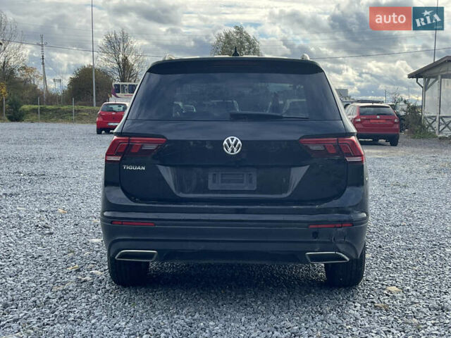 Черный Фольксваген Тигуан, объемом двигателя 2 л и пробегом 160 тыс. км за 12000 $, фото 4 на Automoto.ua