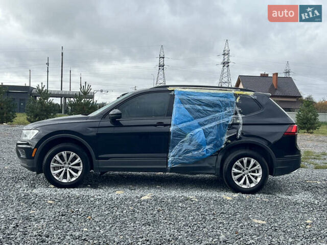 Черный Фольксваген Тигуан, объемом двигателя 2 л и пробегом 160 тыс. км за 12000 $, фото 2 на Automoto.ua