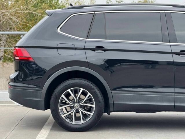 Чорний Фольксваген Тігуан, об'ємом двигуна 2 л та пробігом 117 тис. км за 19650 $, фото 8 на Automoto.ua