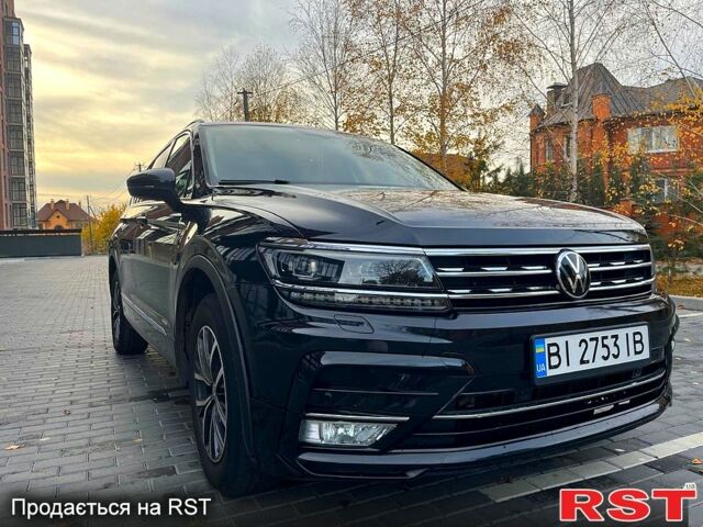 Черный Фольксваген Тигуан, объемом двигателя 2 л и пробегом 133 тыс. км за 22000 $, фото 2 на Automoto.ua