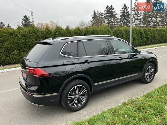 Чорний Фольксваген Тігуан, об'ємом двигуна 2 л та пробігом 124 тис. км за 19500 $, фото 82 на Automoto.ua