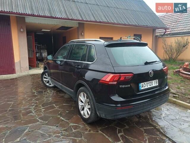 Чорний Фольксваген Тігуан, об'ємом двигуна 1.97 л та пробігом 220 тис. км за 23500 $, фото 1 на Automoto.ua
