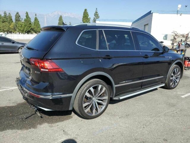 Черный Фольксваген Тигуан, объемом двигателя 2 л и пробегом 104 тыс. км за 4000 $, фото 2 на Automoto.ua