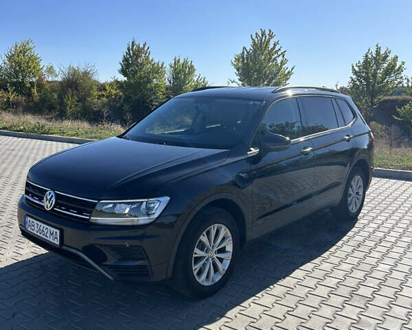Чорний Фольксваген Тігуан, об'ємом двигуна 2 л та пробігом 76 тис. км за 18900 $, фото 1 на Automoto.ua
