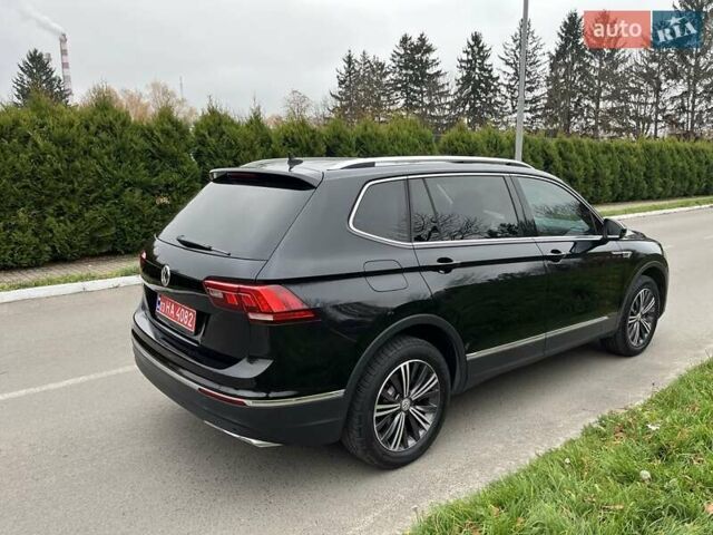 Чорний Фольксваген Тігуан, об'ємом двигуна 2 л та пробігом 124 тис. км за 19500 $, фото 80 на Automoto.ua