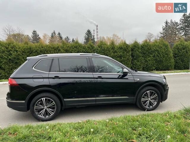Чорний Фольксваген Тігуан, об'ємом двигуна 2 л та пробігом 124 тис. км за 19500 $, фото 83 на Automoto.ua
