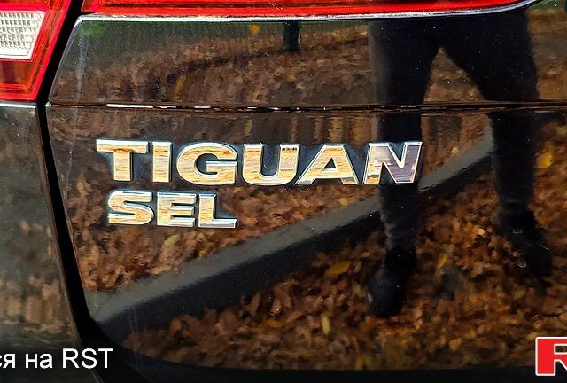 Черный Фольксваген Тигуан, объемом двигателя 2 л и пробегом 314 тыс. км за 15200 $, фото 12 на Automoto.ua