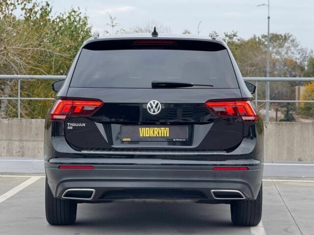 Чорний Фольксваген Тігуан, об'ємом двигуна 2 л та пробігом 117 тис. км за 19650 $, фото 6 на Automoto.ua