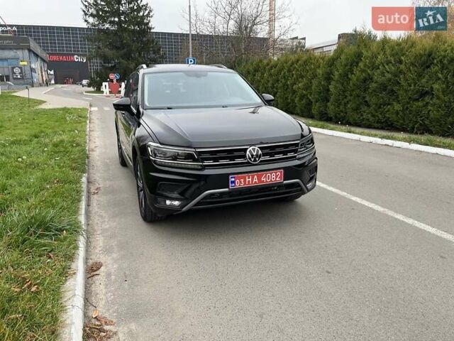 Чорний Фольксваген Тігуан, об'ємом двигуна 2 л та пробігом 124 тис. км за 19500 $, фото 85 на Automoto.ua