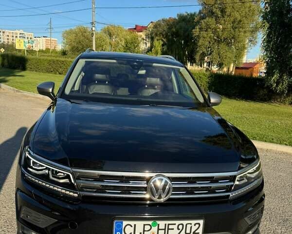 Чорний Фольксваген Тігуан, об'ємом двигуна 2 л та пробігом 223 тис. км за 27799 $, фото 4 на Automoto.ua