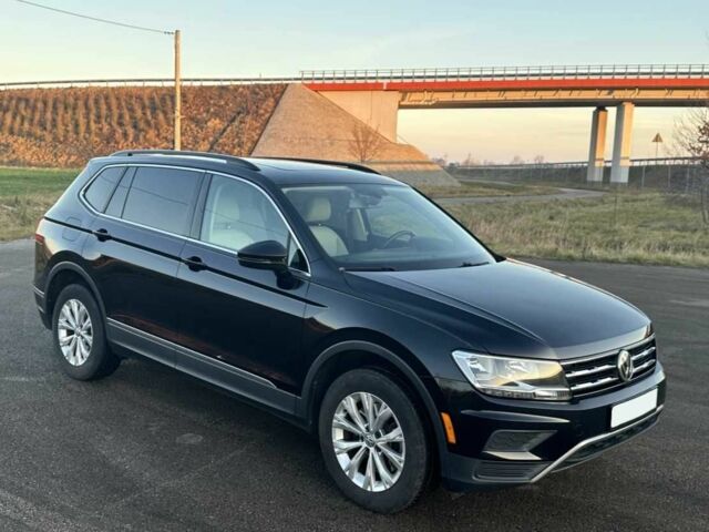 Черный Фольксваген Тигуан, объемом двигателя 2 л и пробегом 109 тыс. км за 11800 $, фото 2 на Automoto.ua