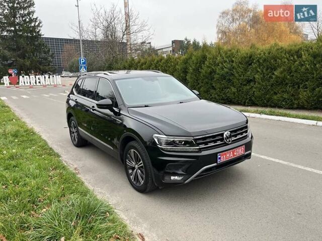 Чорний Фольксваген Тігуан, об'ємом двигуна 2 л та пробігом 124 тис. км за 19500 $, фото 90 на Automoto.ua