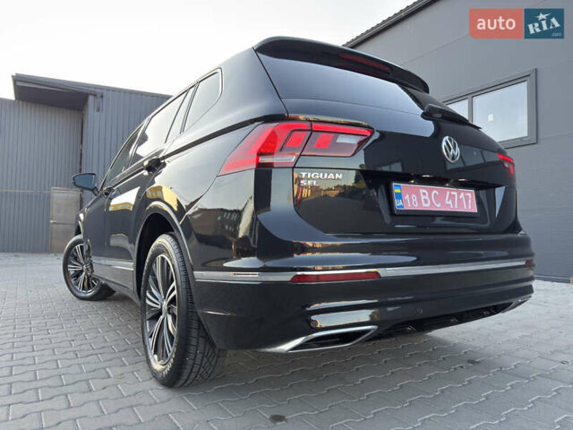 Черный Фольксваген Тигуан, объемом двигателя 2 л и пробегом 231 тыс. км за 16300 $, фото 52 на Automoto.ua