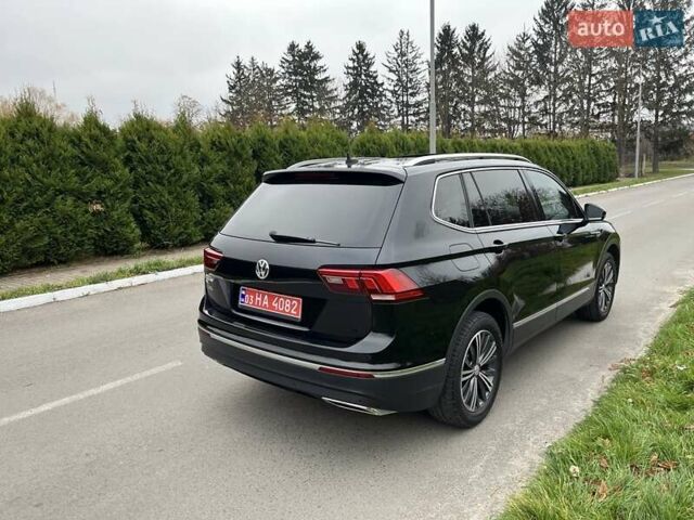 Чорний Фольксваген Тігуан, об'ємом двигуна 2 л та пробігом 124 тис. км за 19500 $, фото 79 на Automoto.ua