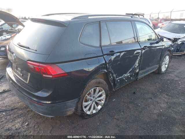 Чорний Фольксваген Тігуан, об'ємом двигуна 2 л та пробігом 115 тис. км за 10100 $, фото 5 на Automoto.ua