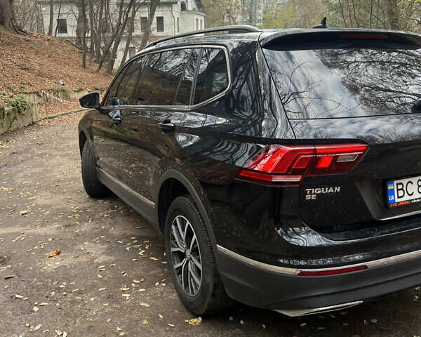 Черный Фольксваген Тигуан, объемом двигателя 1.98 л и пробегом 123 тыс. км за 18500 $, фото 3 на Automoto.ua