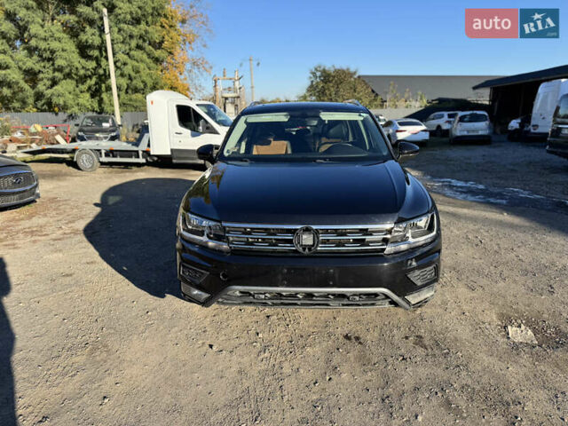 Черный Фольксваген Тигуан, объемом двигателя 2 л и пробегом 133 тыс. км за 11900 $, фото 2 на Automoto.ua