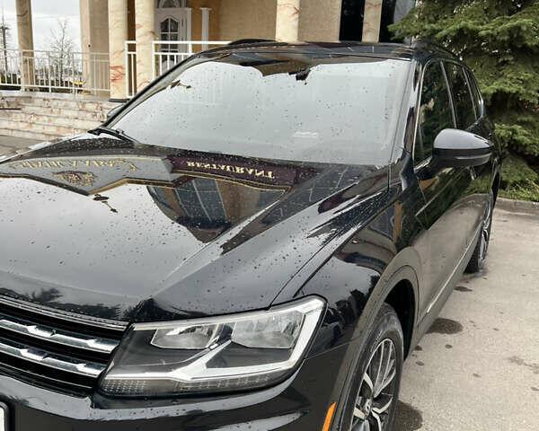 Черный Фольксваген Тигуан, объемом двигателя 2 л и пробегом 130 тыс. км за 18500 $, фото 2 на Automoto.ua