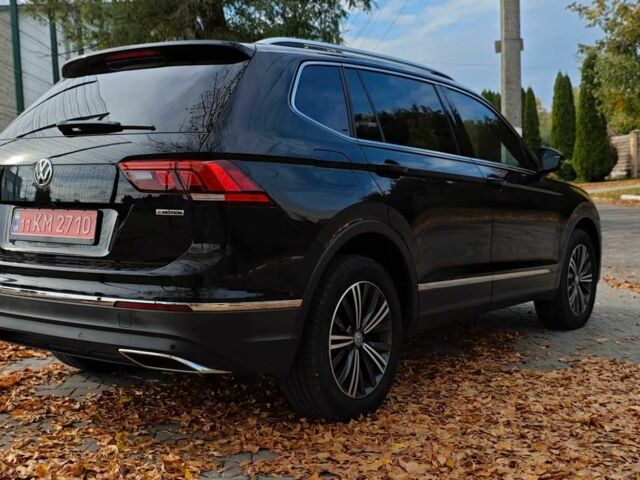 Черный Фольксваген Тигуан, объемом двигателя 2 л и пробегом 314 тыс. км за 14700 $, фото 5 на Automoto.ua