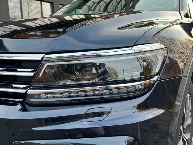 Черный Фольксваген Тигуан, объемом двигателя 2 л и пробегом 133 тыс. км за 22000 $, фото 3 на Automoto.ua