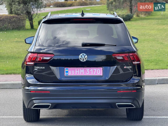 Чорний Фольксваген Тігуан, об'ємом двигуна 2 л та пробігом 109 тис. км за 18950 $, фото 7 на Automoto.ua