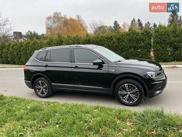 Чорний Фольксваген Тігуан, об'ємом двигуна 2 л та пробігом 124 тис. км за 19500 $, фото 91 на Automoto.ua