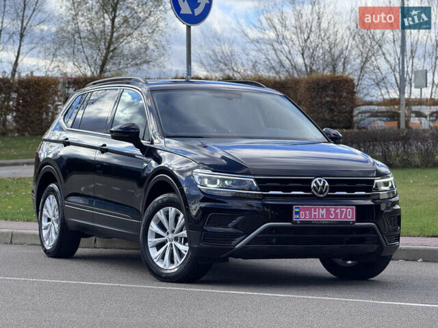 Чорний Фольксваген Тігуан, об'ємом двигуна 2 л та пробігом 109 тис. км за 18950 $, фото 2 на Automoto.ua