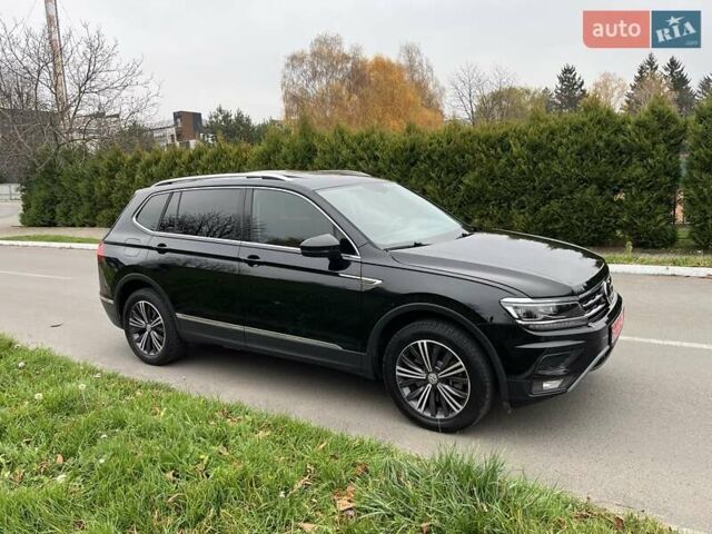 Чорний Фольксваген Тігуан, об'ємом двигуна 2 л та пробігом 124 тис. км за 19500 $, фото 89 на Automoto.ua