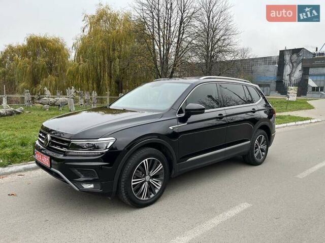 Чорний Фольксваген Тігуан, об'ємом двигуна 2 л та пробігом 124 тис. км за 19500 $, фото 67 на Automoto.ua