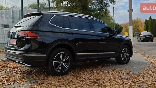 Чорний Фольксваген Тігуан, об'ємом двигуна 1.98 л та пробігом 314 тис. км за 15200 $, фото 7 на Automoto.ua