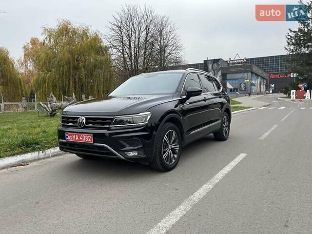 Чорний Фольксваген Тігуан, об'ємом двигуна 2 л та пробігом 124 тис. км за 19500 $, фото 94 на Automoto.ua