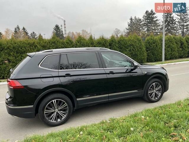 Чорний Фольксваген Тігуан, об'ємом двигуна 2 л та пробігом 124 тис. км за 19500 $, фото 81 на Automoto.ua