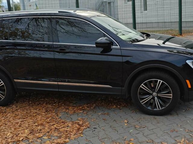 Черный Фольксваген Тигуан, объемом двигателя 2 л и пробегом 314 тыс. км за 14700 $, фото 8 на Automoto.ua