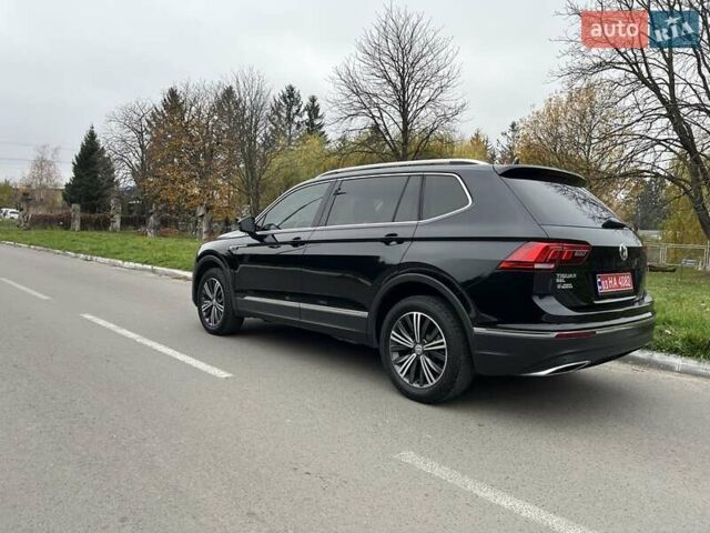 Чорний Фольксваген Тігуан, об'ємом двигуна 2 л та пробігом 124 тис. км за 19500 $, фото 103 на Automoto.ua