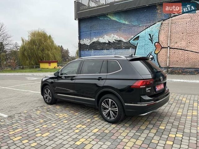 Чорний Фольксваген Тігуан, об'ємом двигуна 2 л та пробігом 124 тис. км за 19500 $, фото 6 на Automoto.ua