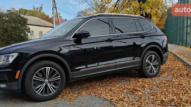 Чорний Фольксваген Тігуан, об'ємом двигуна 1.98 л та пробігом 314 тис. км за 15200 $, фото 21 на Automoto.ua