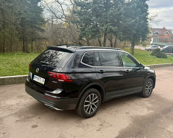Чорний Фольксваген Тігуан, об'ємом двигуна 2 л та пробігом 159 тис. км за 19000 $, фото 3 на Automoto.ua
