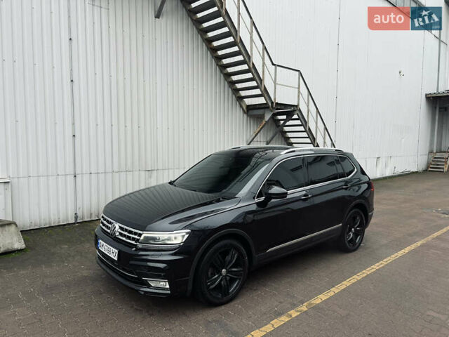 Чорний Фольксваген Тігуан, об'ємом двигуна 1.98 л та пробігом 101 тис. км за 19600 $, фото 2 на Automoto.ua