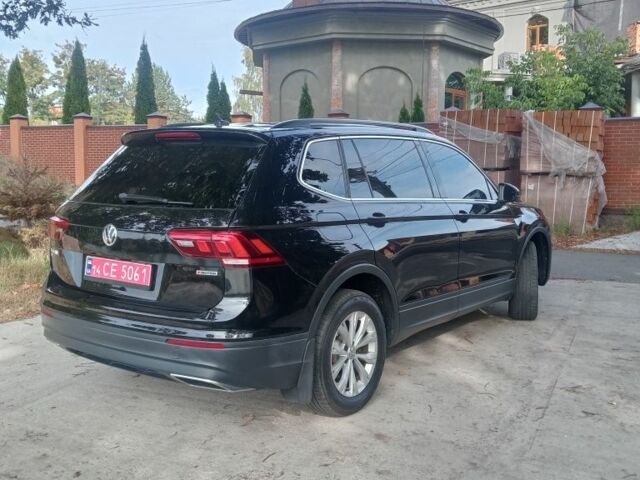 Черный Фольксваген Тигуан, объемом двигателя 2 л и пробегом 122 тыс. км за 19100 $, фото 2 на Automoto.ua