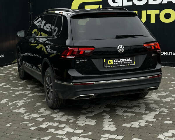 Черный Фольксваген Тигуан, объемом двигателя 1.98 л и пробегом 40 тыс. км за 21500 $, фото 19 на Automoto.ua