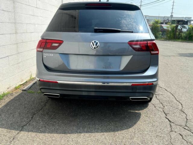 Черный Фольксваген Тигуан, объемом двигателя 2 л и пробегом 41 тыс. км за 4950 $, фото 5 на Automoto.ua