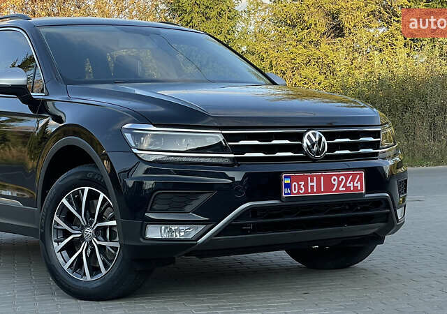 Черный Фольксваген Тигуан, объемом двигателя 2 л и пробегом 170 тыс. км за 18799 $, фото 19 на Automoto.ua