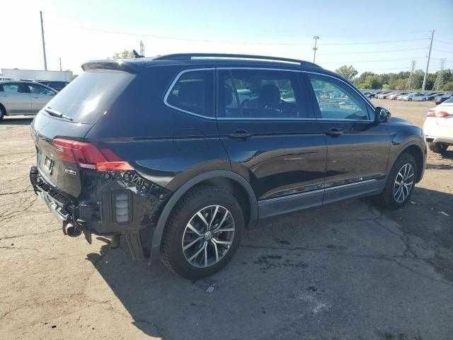 Черный Фольксваген Тигуан, объемом двигателя 2 л и пробегом 64 тыс. км за 4000 $, фото 2 на Automoto.ua