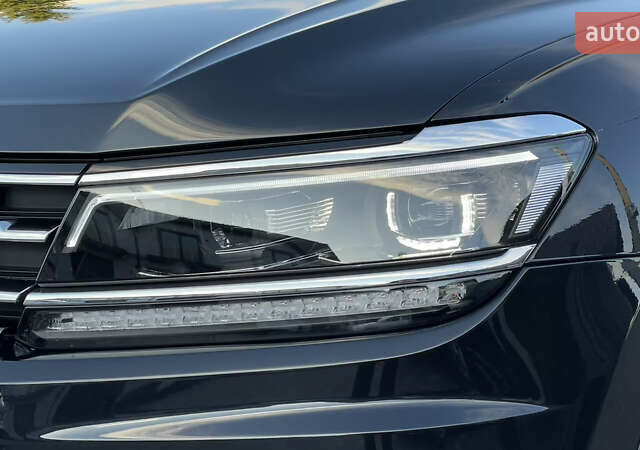 Черный Фольксваген Тигуан, объемом двигателя 2 л и пробегом 170 тыс. км за 18799 $, фото 13 на Automoto.ua