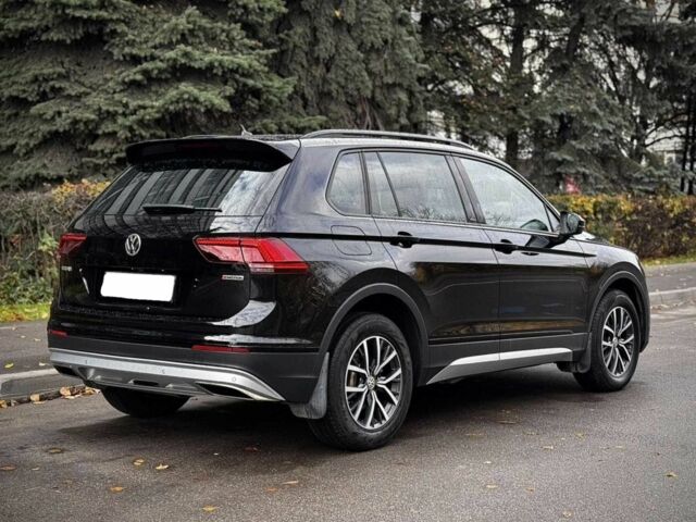 Чорний Фольксваген Тігуан, об'ємом двигуна 2 л та пробігом 134 тис. км за 22000 $, фото 1 на Automoto.ua