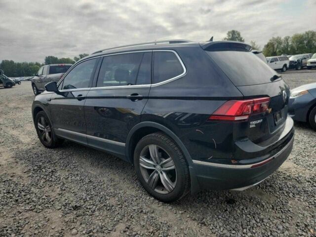 Чорний Фольксваген Тігуан, об'ємом двигуна 2 л та пробігом 80 тис. км за 4000 $, фото 1 на Automoto.ua